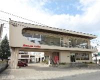 株式会社東北萬国社のロゴ